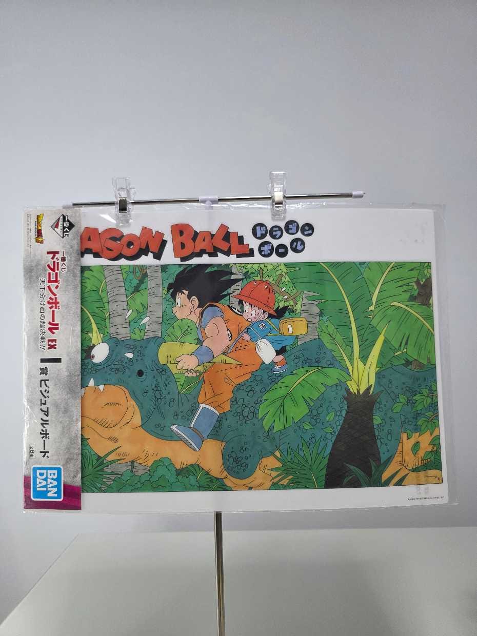 Goku y Gohan sobre un dinosaurio azul